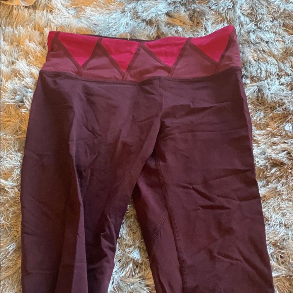 Wonder under maroon leggings